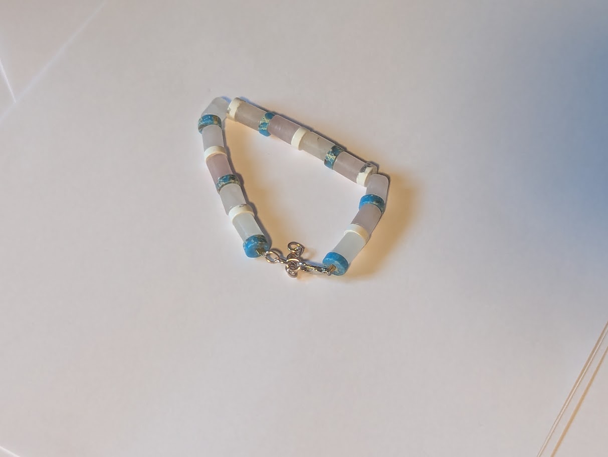 Trans wire bracelet with white howlite, Serpentine, and rose quartz beads